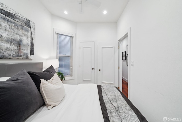 bedroom featuring a ceiling fan, recessed lighting, and wood finished floors