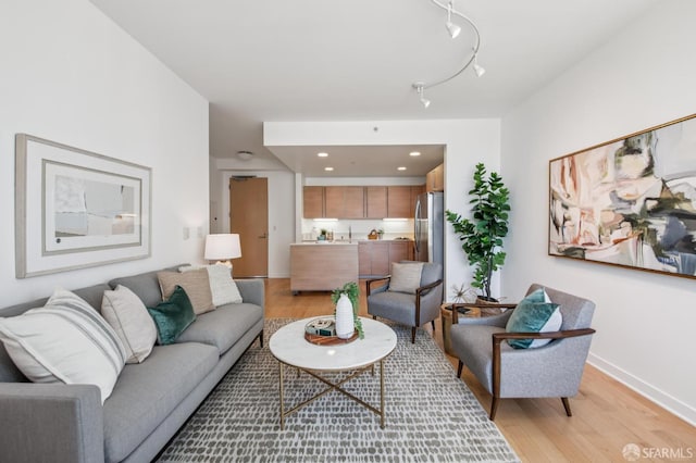 1160 Mission St Unit 2212, San Francisco, CA 94103 - living room featuring light wood finished floors and recessed lighting