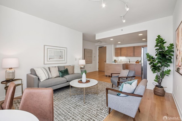 1160 Mission St Unit 2212, San Francisco, CA 94103 - living room featuring light wood-style floors and recessed lighting