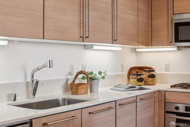 1160 Mission St Unit 2212, San Francisco, CA 94103 - kitchen with stainless steel appliances and light countertops