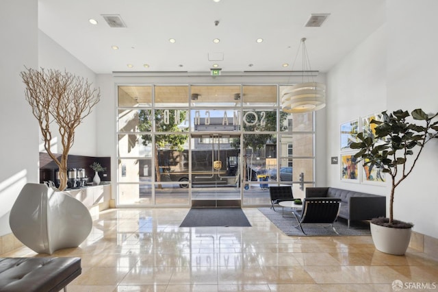 1160 Mission St Unit 2212, San Francisco, CA 94103 - common area featuring a wall of windows and recessed lighting