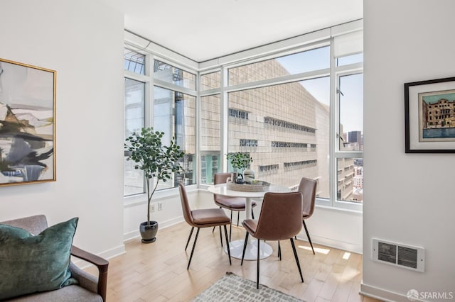 1160 Mission St Unit 2212, San Francisco, CA 94103 - dining space with wood finished floors and baseboards
