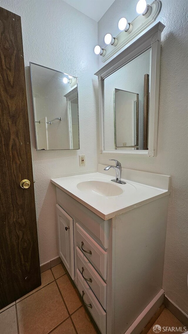 2011 Market Ave Unit 324, San Pablo, CA 94806 - bathroom featuring vanity and tile patterned floors