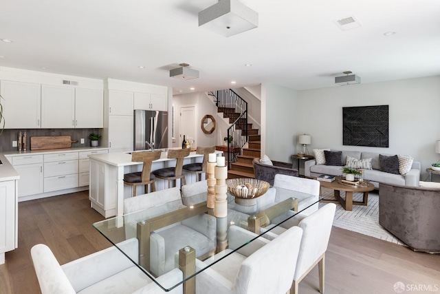 dining room featuring light hardwood / wood-style floors