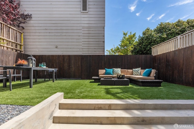 view of yard with an outdoor living space