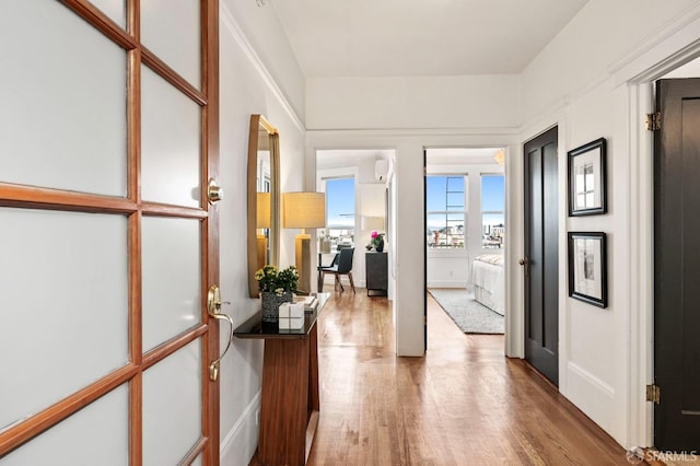 hallway featuring wood finished floors