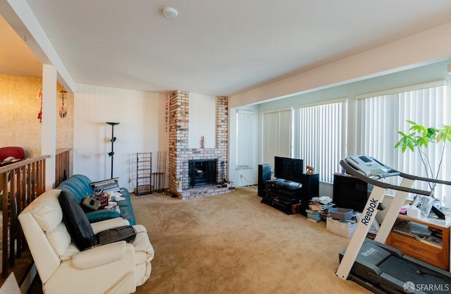 living room featuring carpet flooring and a brick fireplace