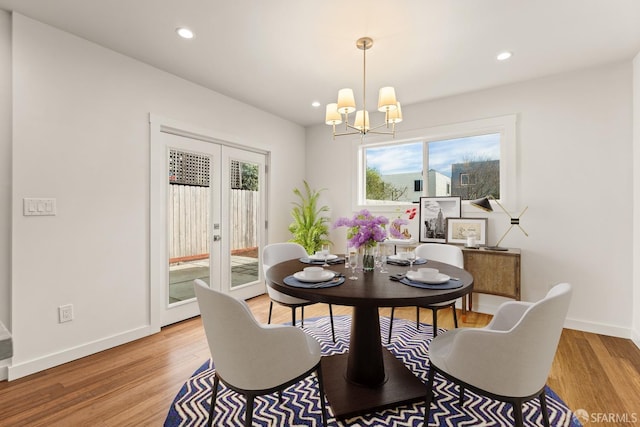 dining room featuring recessed lighting, french doors, baseboards, and light wood finished floors