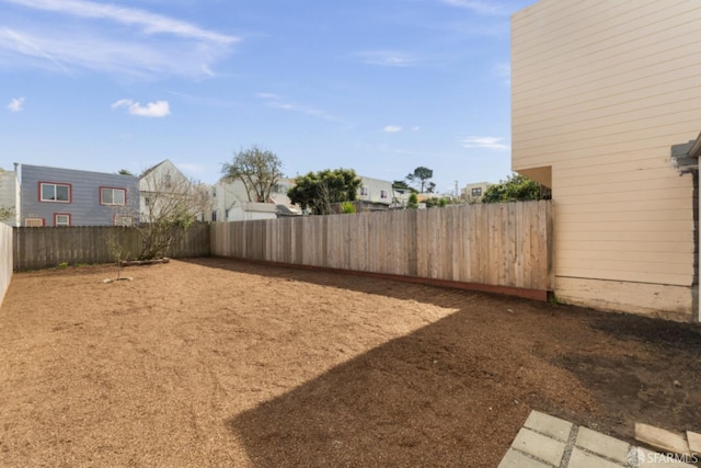 view of yard featuring a fenced backyard