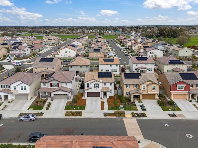birds eye view of property with a residential view