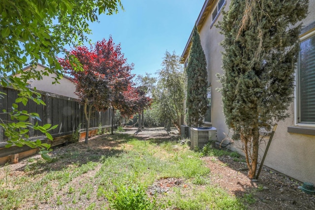 549 Fresian Dr, Oakdale, CA 95361 - view of yard with central AC and fence