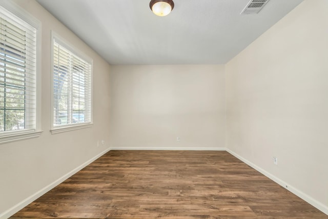 549 Fresian Dr, Oakdale, CA 95361 - empty room featuring dark wood finished floors and baseboards