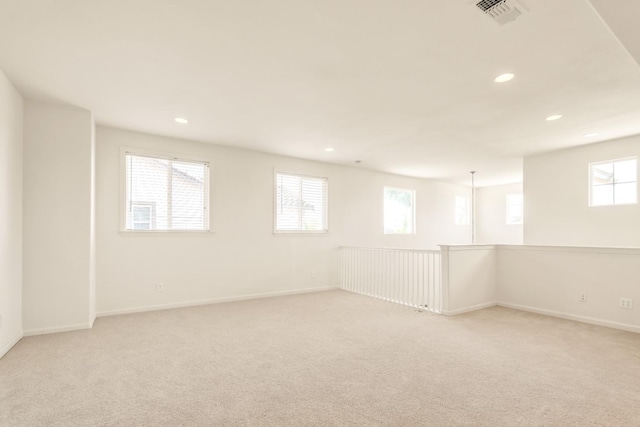549 Fresian Dr, Oakdale, CA 95361 - below grade area featuring light carpet, recessed lighting, and baseboards