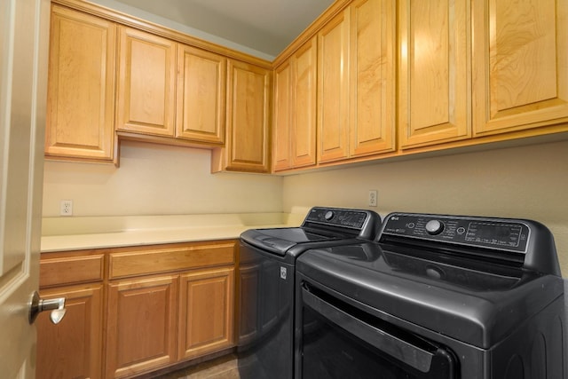 549 Fresian Dr, Oakdale, CA 95361 - clothes washing area with cabinet space and washer and clothes dryer