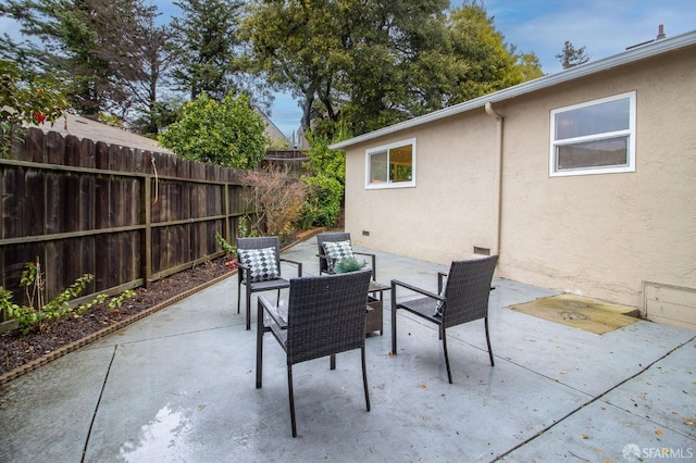 view of patio / terrace with fence