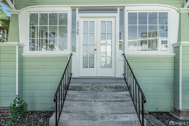 entrance to property featuring french doors