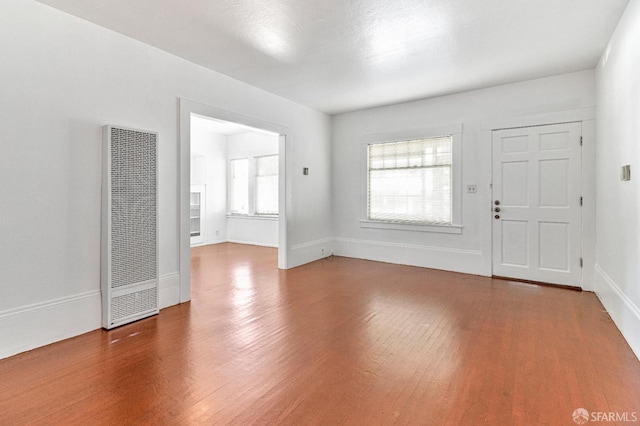 entrance foyer featuring hardwood / wood-style flooring