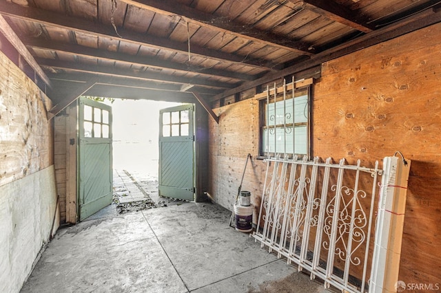miscellaneous room with beamed ceiling and wooden ceiling