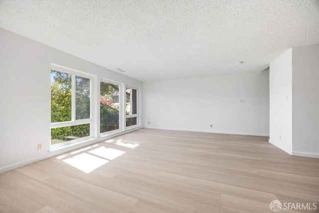 521 Ridgeview Ct, Pleasant Hill, CA 94523 - spare room with light wood finished floors, a textured ceiling, and baseboards