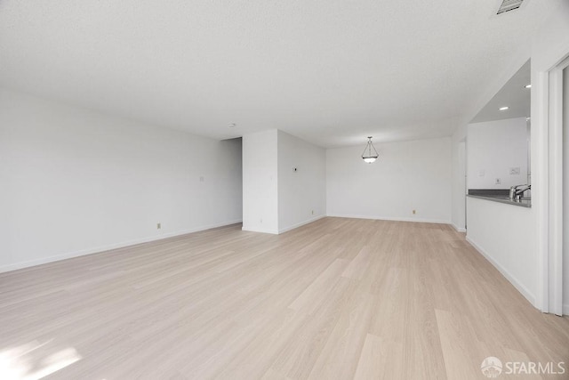 521 Ridgeview Ct, Pleasant Hill, CA 94523 - unfurnished living room with light wood-style floors, baseboards, and recessed lighting
