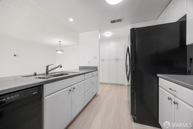 521 Ridgeview Ct, Pleasant Hill, CA 94523 - kitchen with black appliances, light wood-style flooring, a sink, white cabinets, and recessed lighting