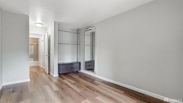 unfurnished bedroom featuring light hardwood / wood-style flooring