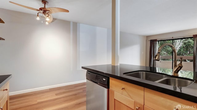 kitchen with sink, ceiling fan, light brown cabinetry, stainless steel dishwasher, and light wood-type flooring