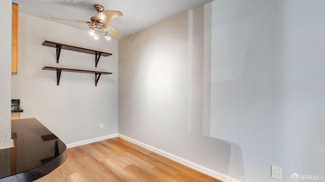 unfurnished dining area with ceiling fan and light hardwood / wood-style flooring