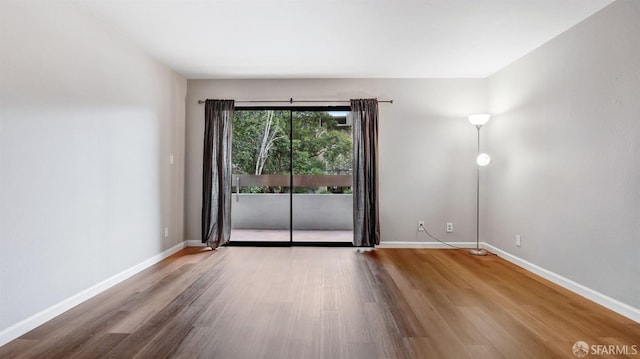 empty room featuring hardwood / wood-style floors