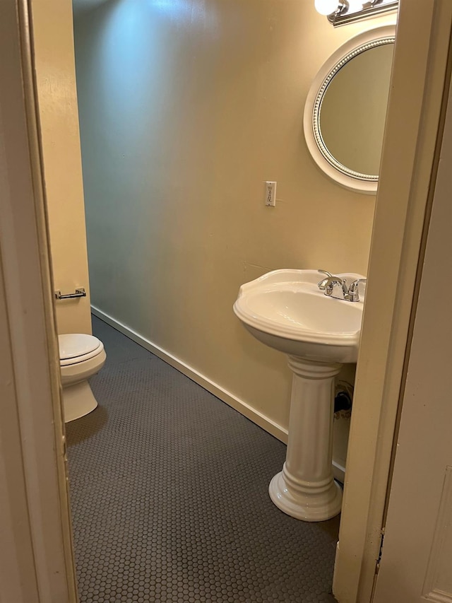 bathroom featuring toilet