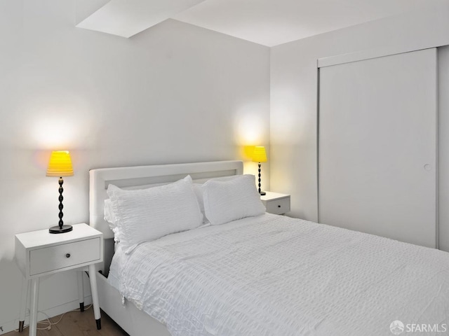 bedroom featuring wood-type flooring