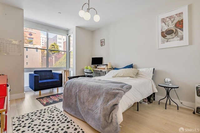 989 Sutter St Unit 2, San Francisco, CA 94109 - bedroom with wood finished floors and baseboards