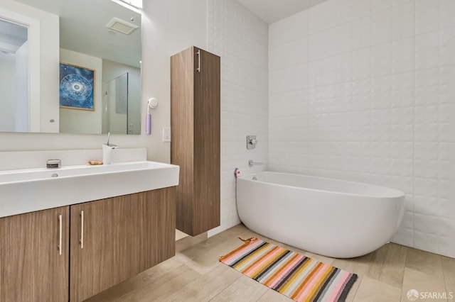 989 Sutter St Unit 2, San Francisco, CA 94109 - bathroom with a freestanding tub and vanity