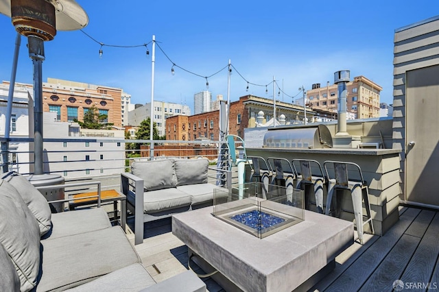 989 Sutter St Unit 2, San Francisco, CA 94109 - wooden terrace featuring an outdoor living space with a fire pit and a view of city