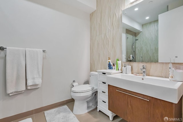 989 Sutter St Unit 2, San Francisco, CA 94109 - bathroom with vanity, toilet, tiled shower, tile patterned floors, and recessed lighting