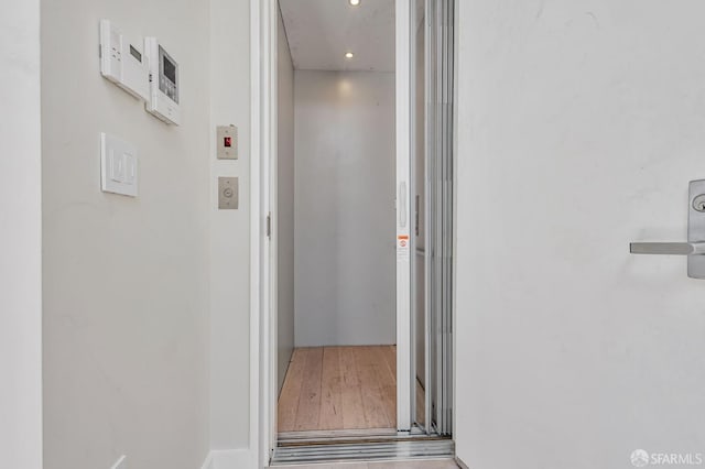 989 Sutter St Unit 2, San Francisco, CA 94109 - corridor with elevator, recessed lighting, and wood finished floors
