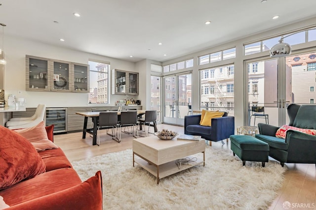 989 Sutter St Unit 2, San Francisco, CA 94109 - living room featuring wine cooler, light wood-type flooring, recessed lighting, and bar area