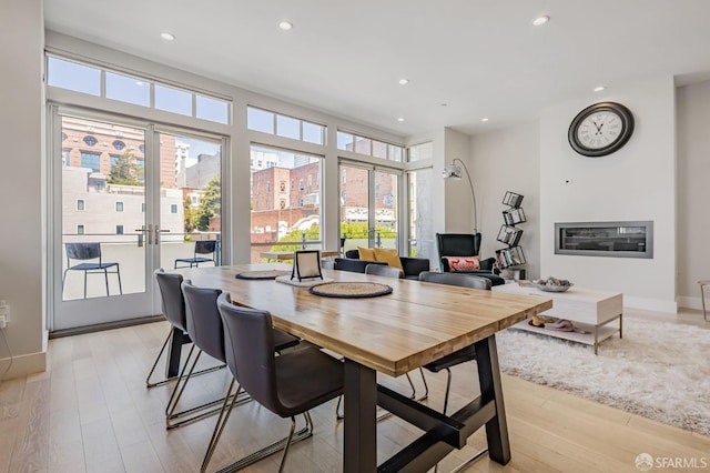 989 Sutter St Unit 2, San Francisco, CA 94109 - dining area with recessed lighting, light wood-style floors, healthy amount of natural light, baseboards, and french doors