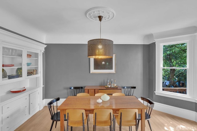 dining room with light wood finished floors