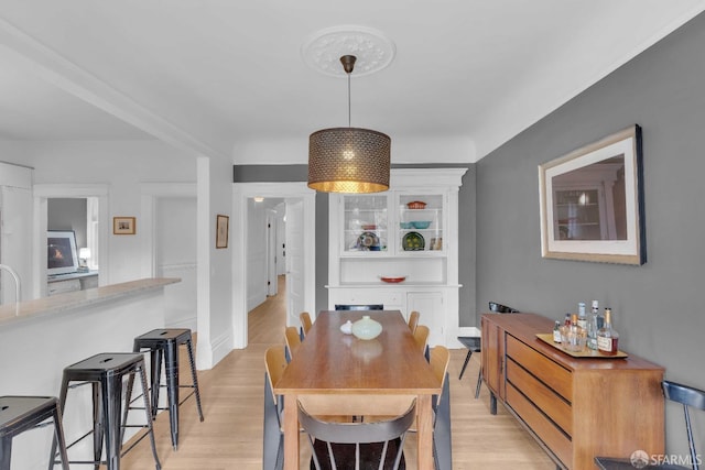 dining room featuring light wood-style flooring
