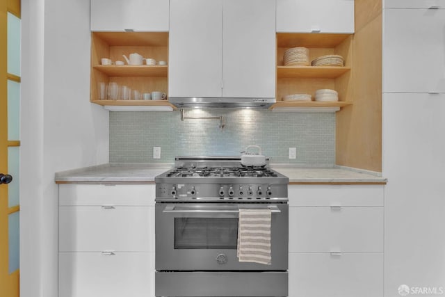 kitchen featuring stainless steel range, tasteful backsplash, modern cabinets, open shelves, and white cabinets