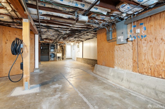 basement with washer / clothes dryer and electric panel