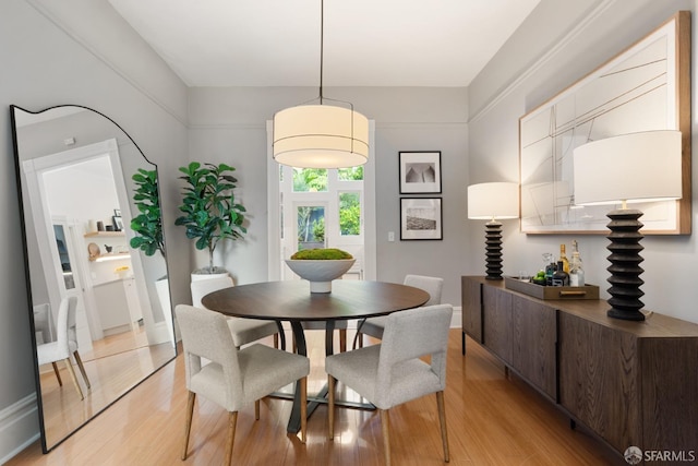 dining room featuring light hardwood / wood-style flooring