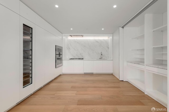 interior space featuring light hardwood / wood-style flooring and sink