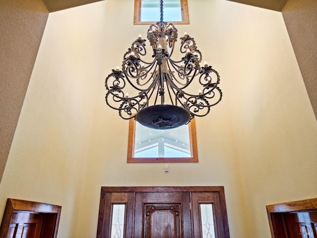 details with an inviting chandelier