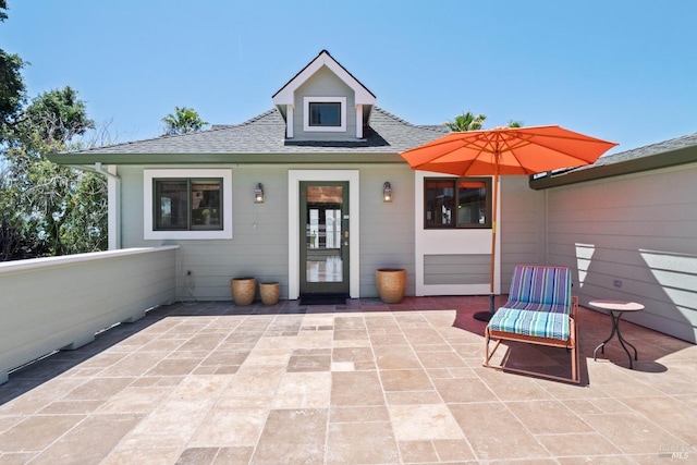 rear view of house with a patio area