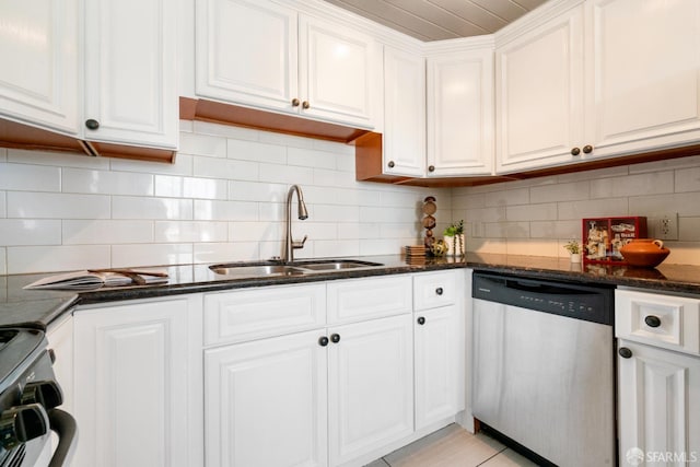 27 Nancy Dr, San Pablo, CA 94806 - kitchen featuring stainless steel dishwasher, a sink, white cabinets, range, and dark stone counters