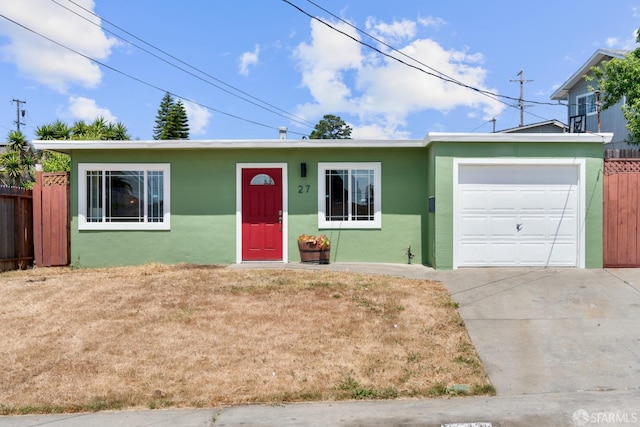27 Nancy Dr, San Pablo, CA 94806 - single story home featuring stucco siding, an attached garage, and concrete driveway