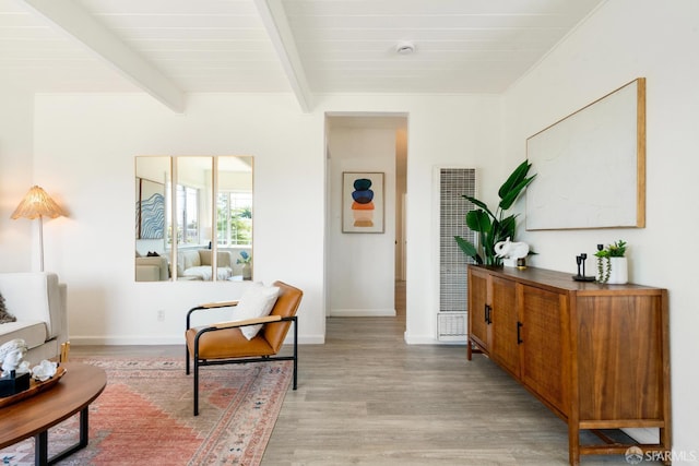 27 Nancy Dr, San Pablo, CA 94806 - living area featuring a heating unit, light wood-style flooring, beamed ceiling, and baseboards