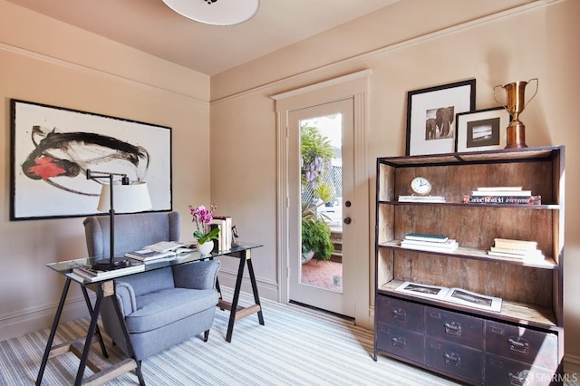 carpeted office featuring baseboards